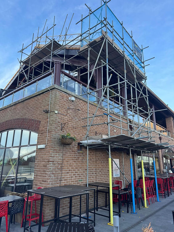 Scaffolding around pub with safe outside eating area