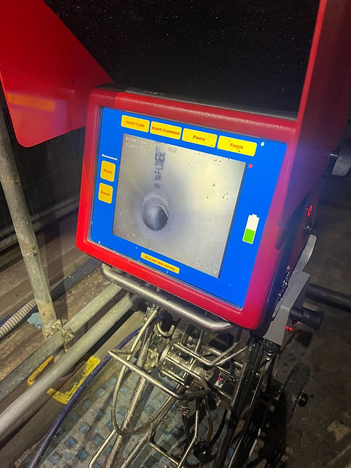 Close up of a professional drainage survey control box with a digital monitoring screen active on site