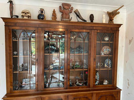 Antiques and collectable in cupboard