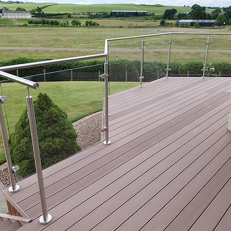 Metal and glass fence around domestic property