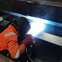 Welding under mechanics inspection pit