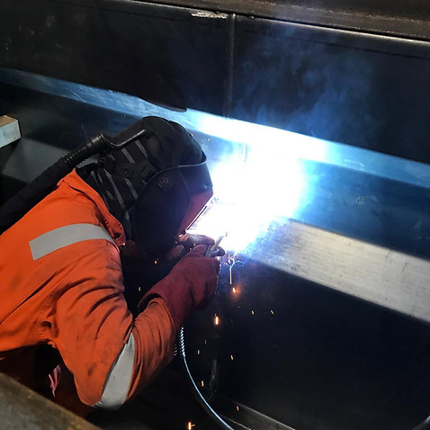 Welding under mechanics inspection pit