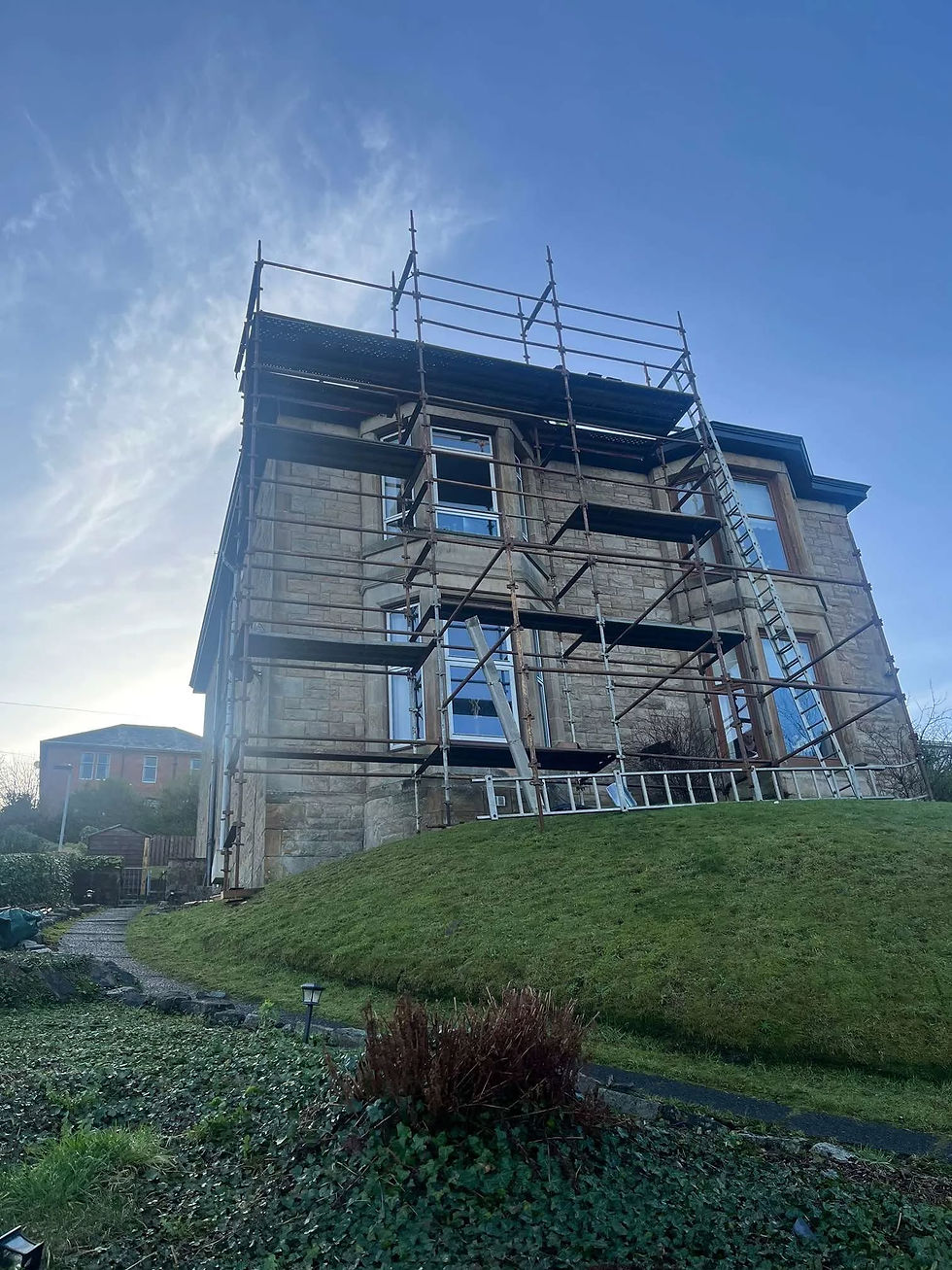 Scaffolding around large property ready for roof work