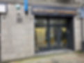 CCTV camera and security system on wall outside commercial property