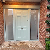 Sturdy front door with panel windows