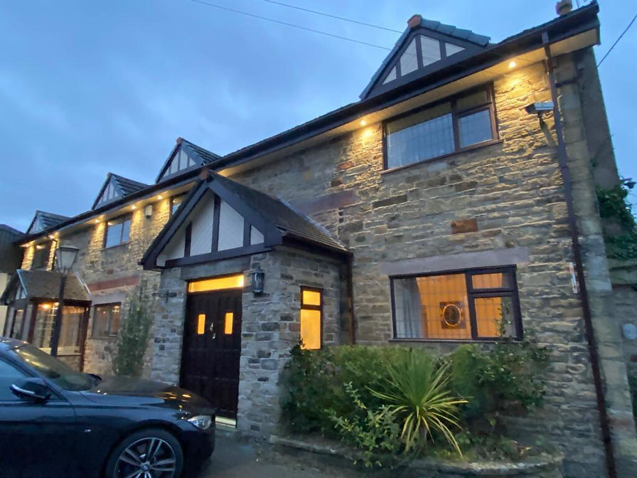 Stone clad house external view residential property