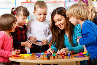 Children around table crafting