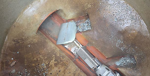 Robotic cutting tool precisely reopening a lateral pipe connection after a lining installation