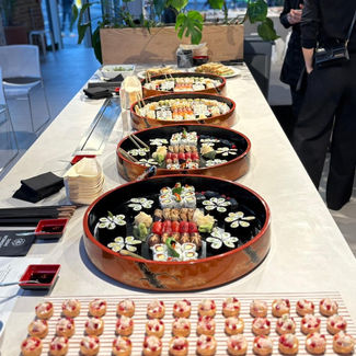 Large sushi bowls and selection of sushi