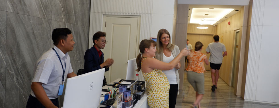 BIJOU guests taking selfie with front office staff