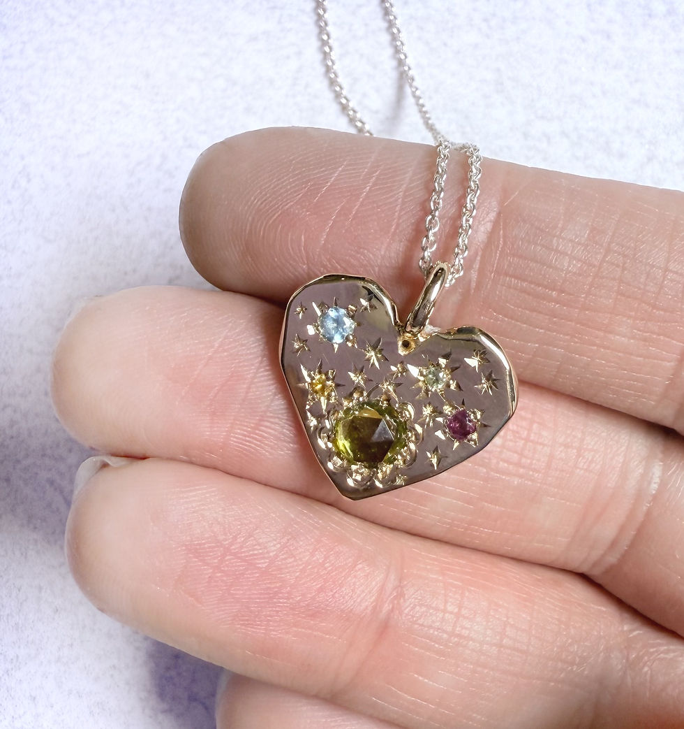 Bronze heart pendant: Tourmaline, Topaz, Rhodolite, Peridot and Citrine