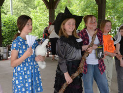 People in book character costumes
