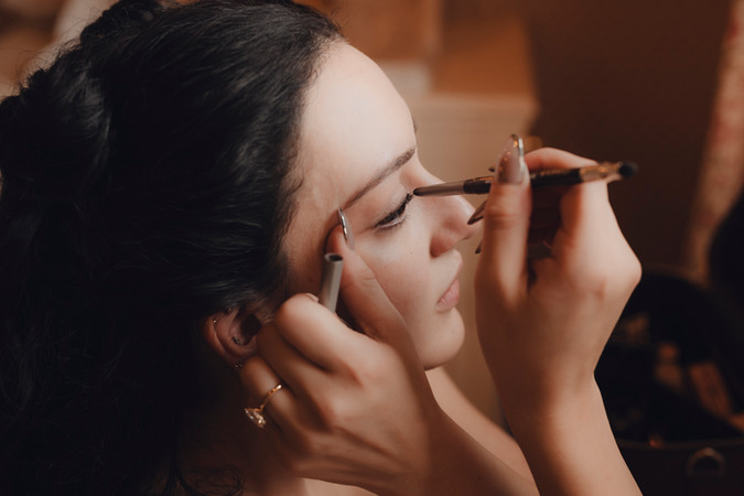 Bride’s makeup, dress, and accessories photographed in fine art and editorial style