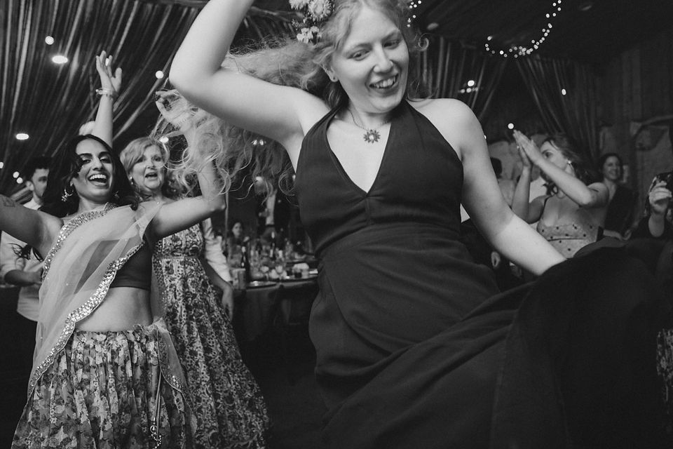Guests dancing during a Scotland wedding reception captured by a Scotland wedding photographer.