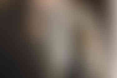 Natural groom preparation moments during a Scotland woodland wedding captured by a Scotland wedding photographer.