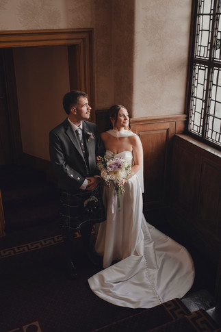 Editorial style bride and groom portraits on iconic staircase at Edinburgh City Chambers