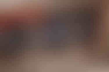 Bride getting ready in Edinburgh, capturing makeup, dress details, and first look moments for City Chambers wedding.