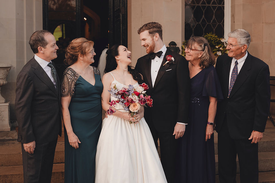 Documentary style portraits of family interactions and joy during castle wedding