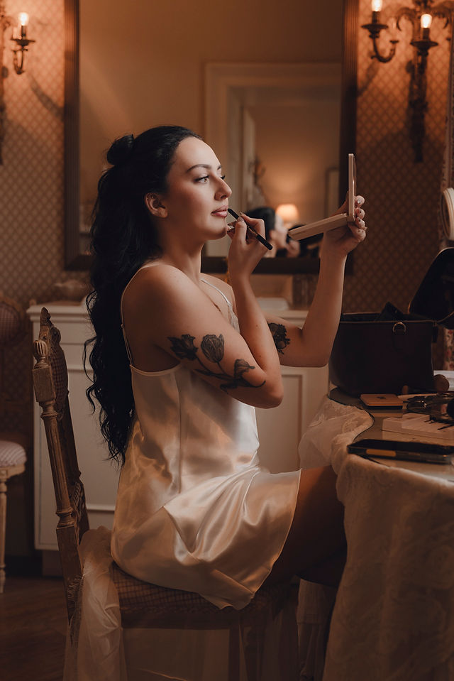 Bride’s accessories, dress details, and emotional moments photographed in cinematic castle setting.”