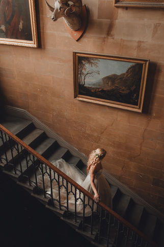 romantic elopement  portrait in Duns castle, cinematic fine art wedding photography in Scotland landscape
