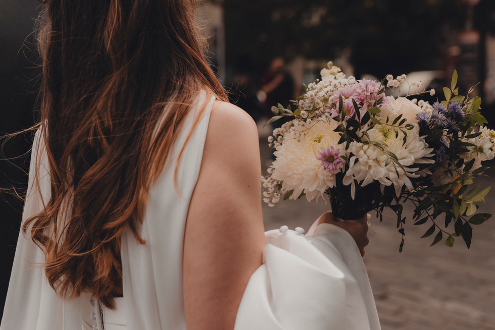 Romantic City of Edinburgh portraits at Victoria Street during City Chambers wedding day.
