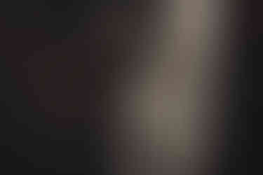 Groom preparation in Dalhousie Castle medieval interiors before intimate Scotland elopement