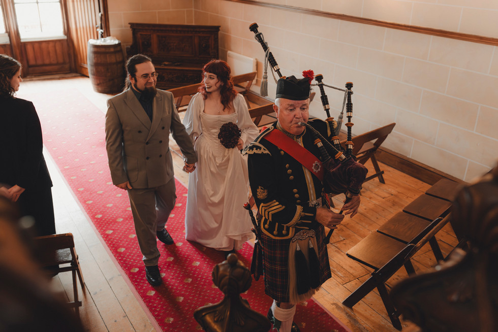 Romantic ceremony moments in medieval surroundings at Dalhousie Castle Scotland