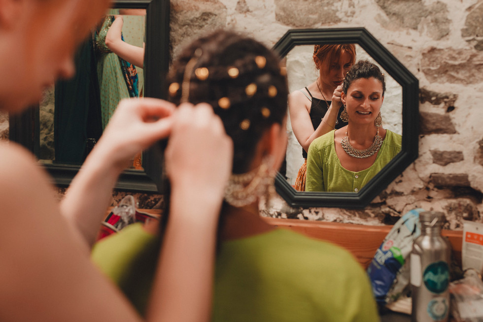Bride getting ready before the ceremony in Scotland photographed by a Scotland wedding photographer.