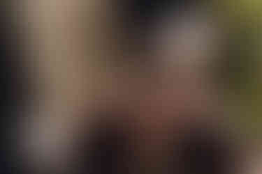 Groom in traditional Scottish kilt adjusting jacket before ceremony, captured at Dundas Castle, drawing room by Garrigós & Golebiowski.