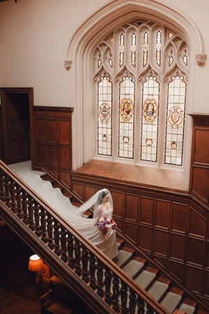 Editorial-style portrait of the bride in motion, capturing storytelling and romantic elegance