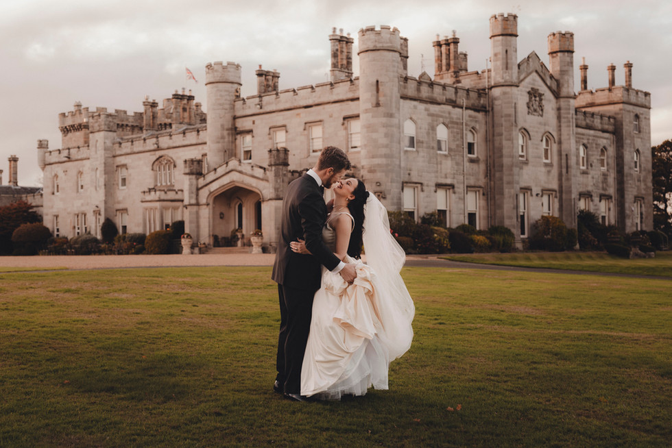 Editorial storytelling portraits of bride and groom during sunset in Scottish castle gardens
