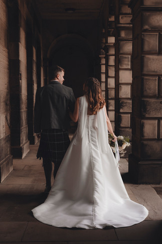 Editorial style wedding portraits with St Giles Cathedral in Edinburgh as backdrop