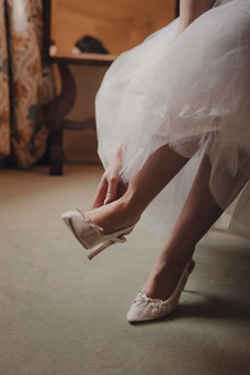 Close-up of bridal accessories and flat light photography in Dundas Castle, cinematic and elegant