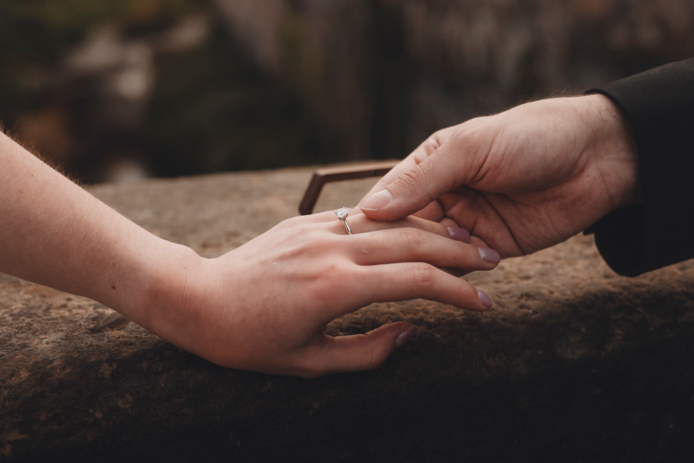 Edinburgh wedding photographer capturing a couple’s romantic elopement along the historic streets of Dean Village.