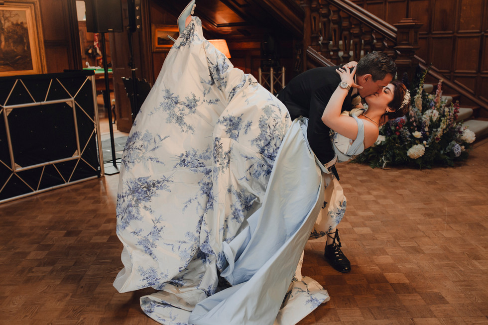 Couple’s first dance in the Main Hall of Dundas Castle, warm cinematic light and emotional atmosphere.