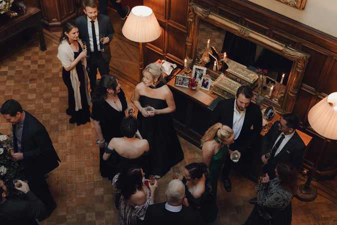 Dramatic and elegant golden hour portraits of couple in castle grounds