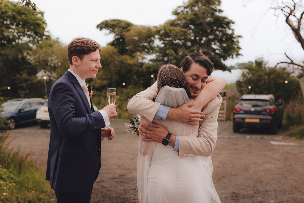 Guests enjoying drinks reception at The Free Company, Balerno – relaxed and editorial Scotland wedding photography.