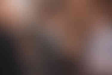 Bride and groom enjoying drinks reception with friends and family at St Columba’s, Edinburgh