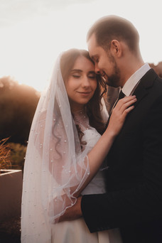 Edinburgh wedding photographer capturing a couple’s romantic elopement along the historic streets of Dean Village.