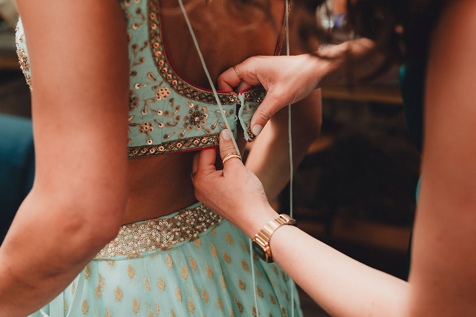 Bride preparation during a woodland wedding at Comrie Croft captured by a Scotland wedding photographer.
