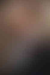 Cinematic and editorial photography capturing intimate and joyful groom preparation moments in Scotland