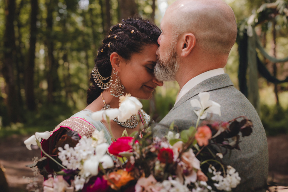 Intimate woodland wedding ceremony at Comrie Croft captured by a Scotland wedding photographer.