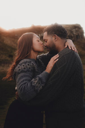 Cinematic destination couple photoshoot in Edinburgh, intimate and emotional portrait in a natural Scottish landscape. Holyrood
