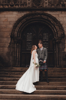 Bride and groom portraits outside St Giles Cathedral, Edinburgh, cinematic wedding photography.