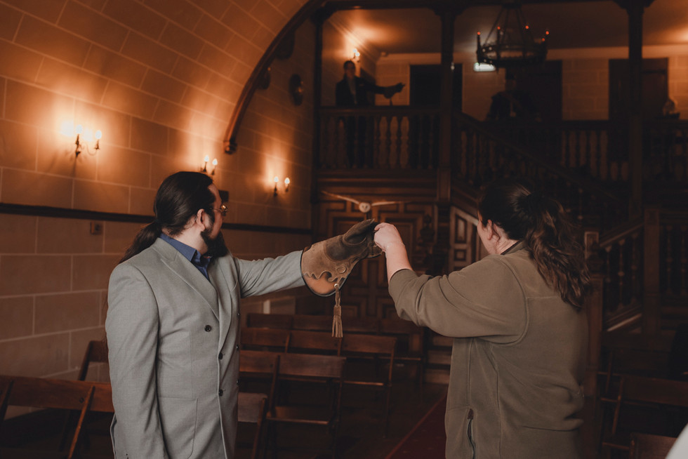 Owl delivering wedding rings during Dalhousie Castle elopement ceremony in Scotland