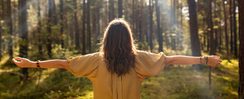 nature, spirituality and supernatural concept - young woman or witch performing magic ritu
