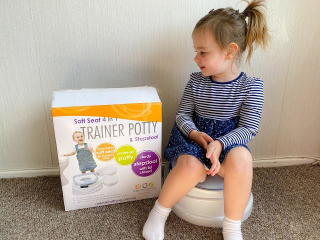 Little Girl sitting on her new potty
