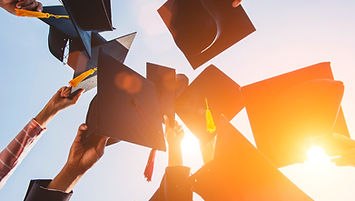 graduates-throw-the-hat-at-the-diploma-ceremony-at-the-university.jpg