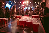 andypineapples_a_photo_of_people_playing_beer_pong_in_a_night_ea26e64e-d19c-46b4-83af-de84