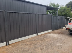 Monument Colorbond with plinths and double gates.